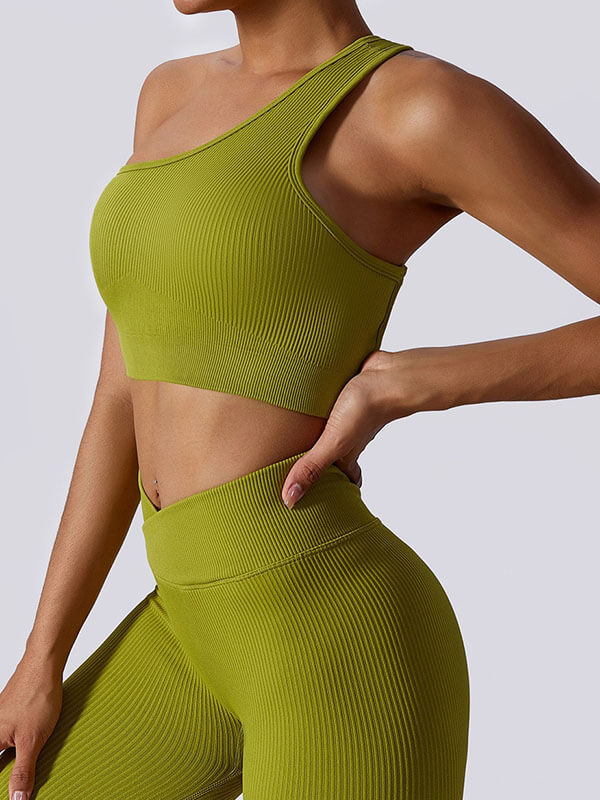 Green one-shoulder sports bra for women, perfect for fitness, featuring breathable nylon-spandex fabric for comfort.
